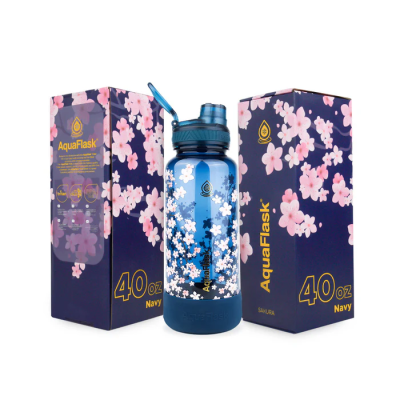 زجاجة مياه بلاستيك شفافة بعليقة وشاليموه + قاعدة سيليكون Trek Sakura 2